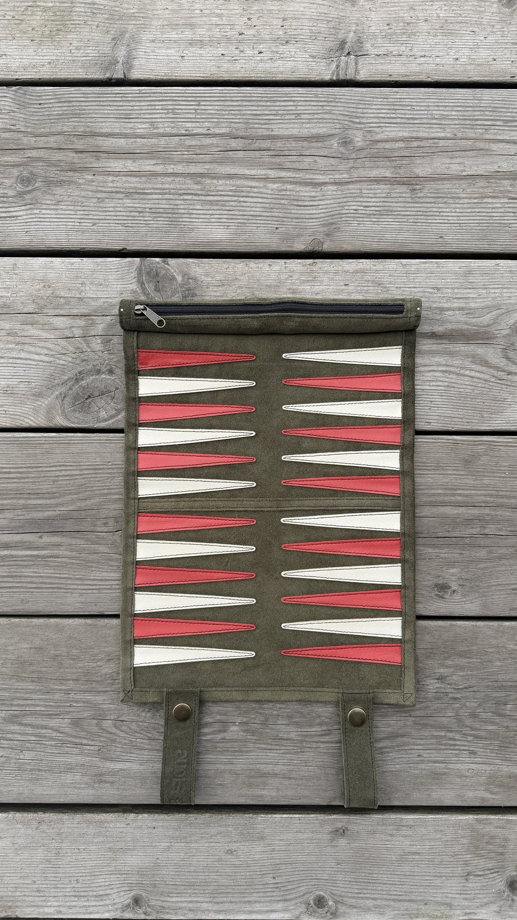 Close-up of Olive Green suede backgammon stitching and edge detail